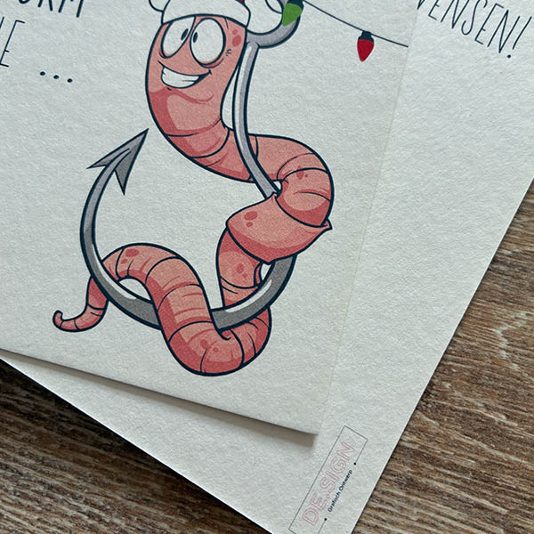 Detail van kerstworm voorkant en achterkant logo - Kerstkaartje sturen? Worm nie ... - DE.sign